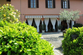 Гостиница La Corte B&B  Пассирано